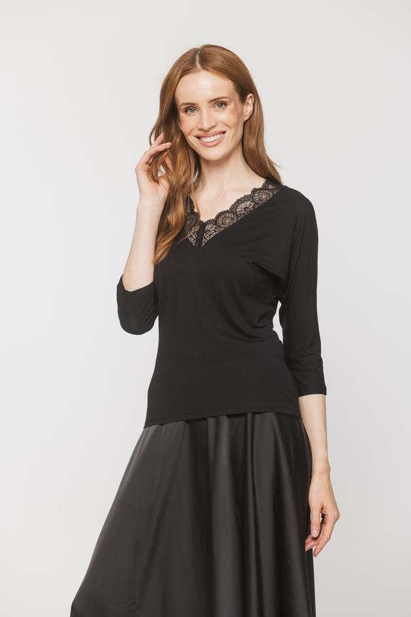 Black knit blouse with lace at the neckline