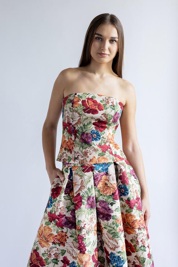 A jacquard corset made from a matt fabric with a floral pattern