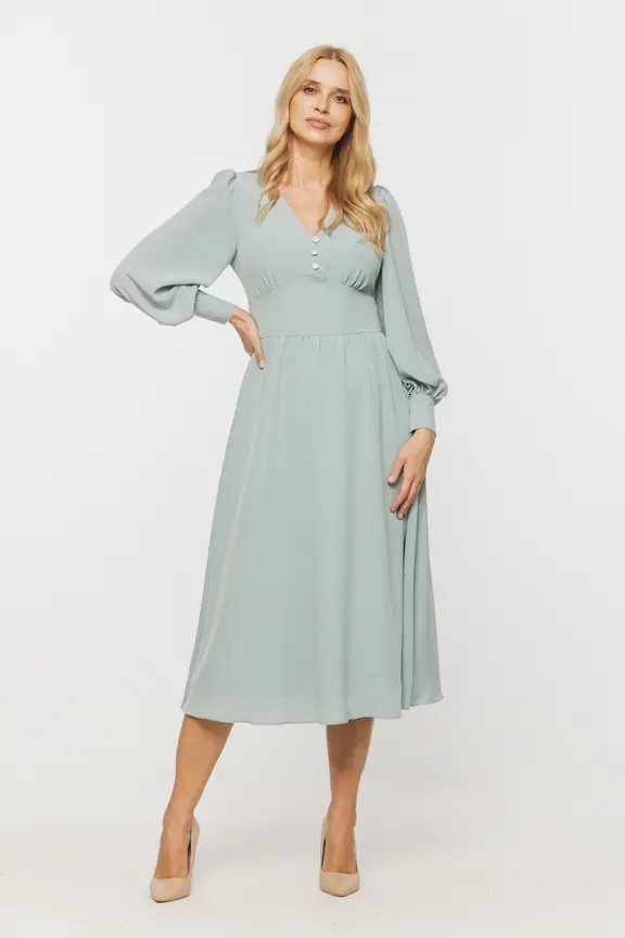 Koktajlowa zwiewna sukienka w seledynowym kolorze