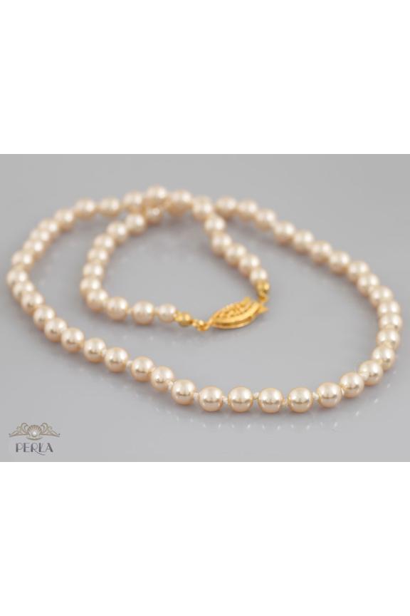 Krótki elegancki naszyjnik z beżowych perełek