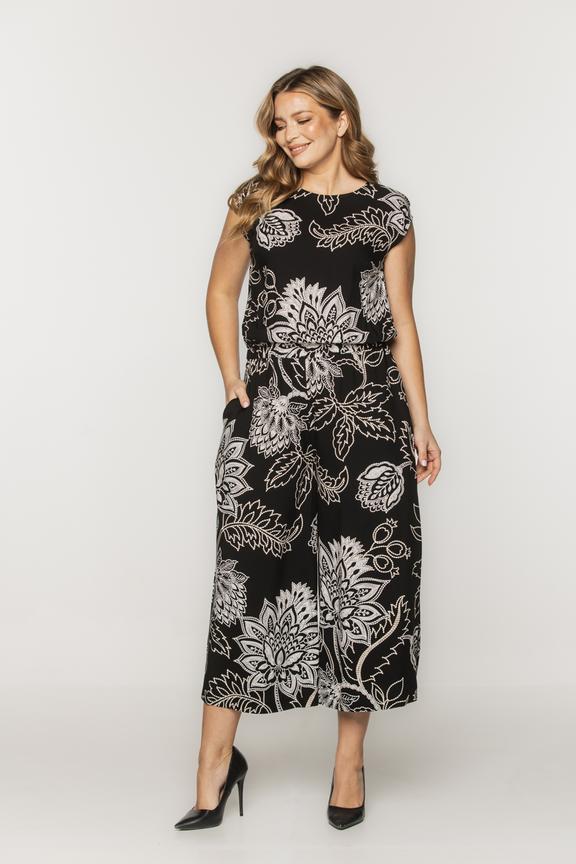 Patterned jumpsuit with leg slits