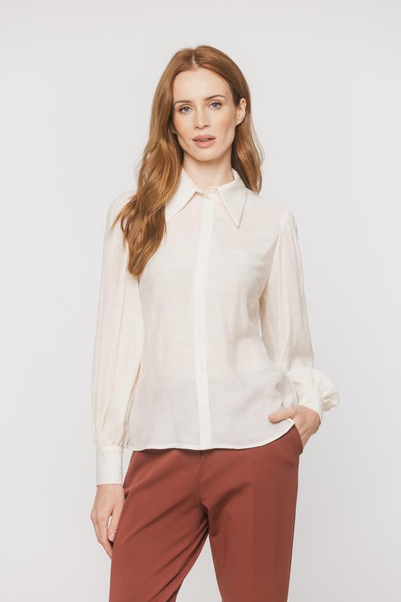 A light airy shirt made from textured cream-coloured viscose